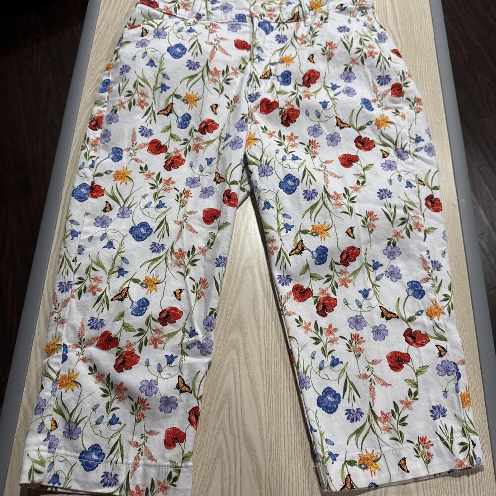 White floral capri pants with red, blue, and orange flowers and butterflies, siz